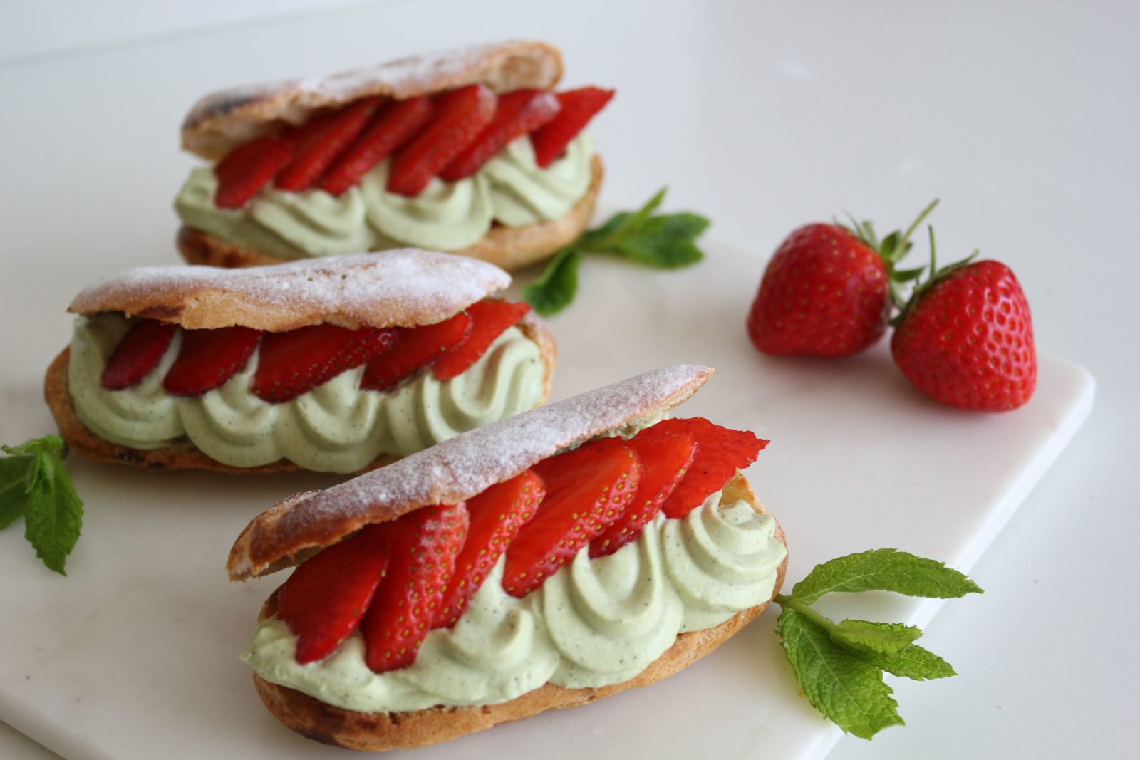 Strawberry matcha eclairs