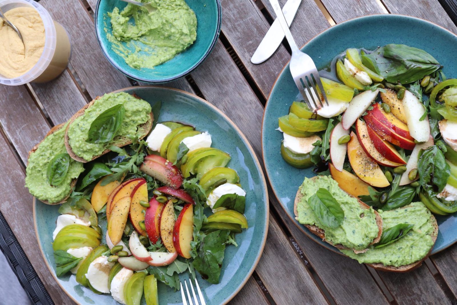 Summer salad with avocado pesto toast