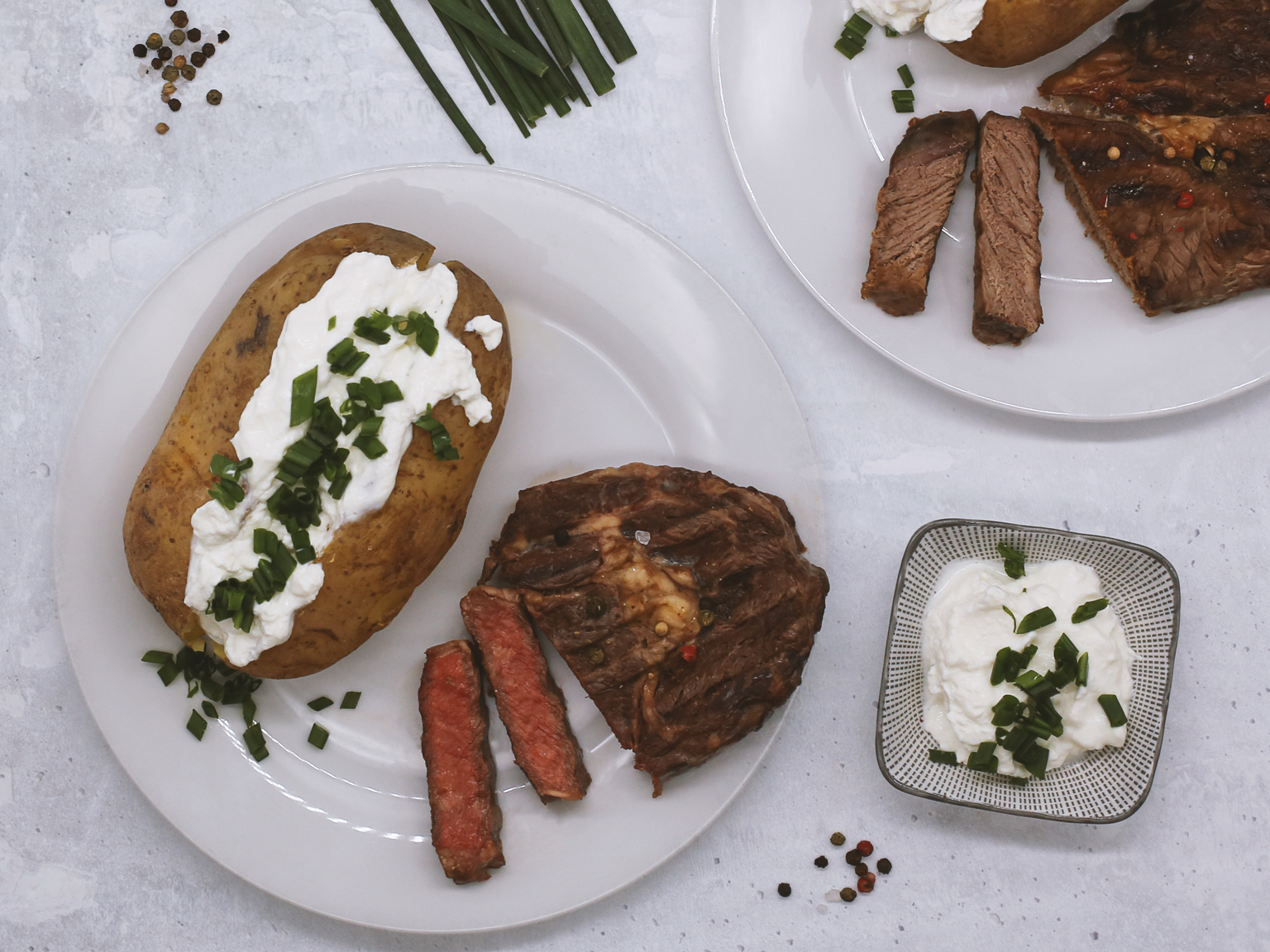 Beef stake and cream cheese-stuffed potato