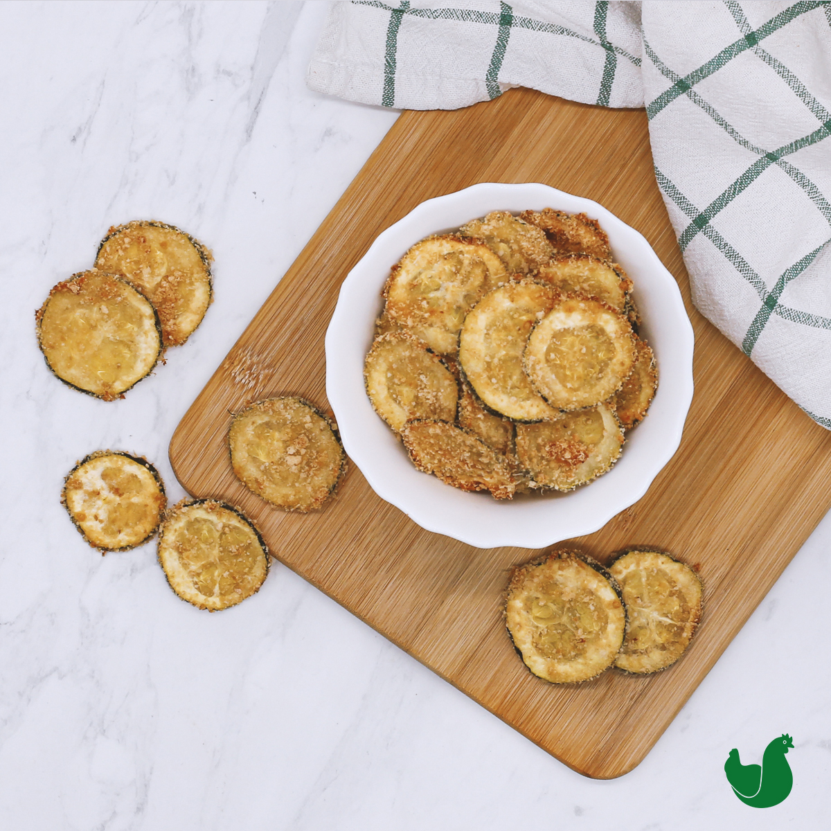 Courgette crisps on white background