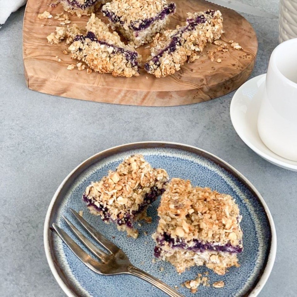 Blueberry muesli riegel on a blue plate