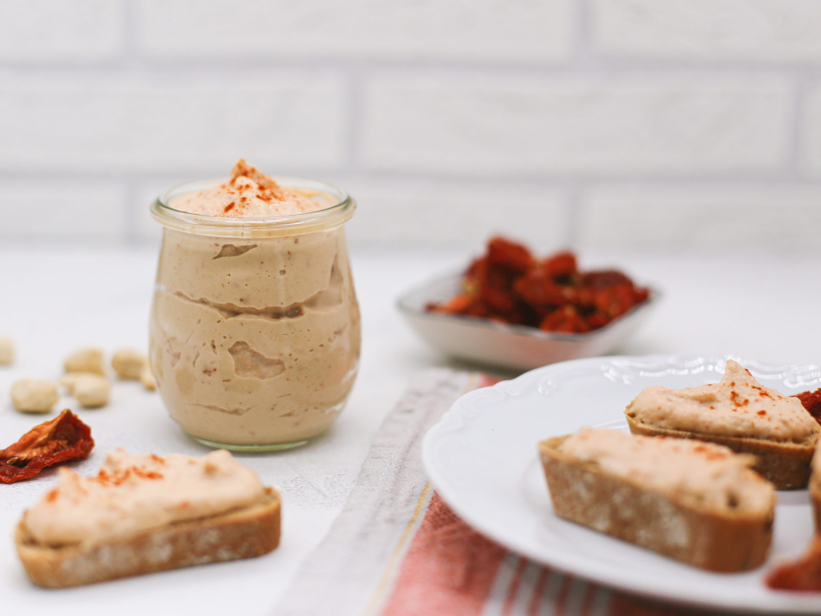 cashew-tomato spread in a jar