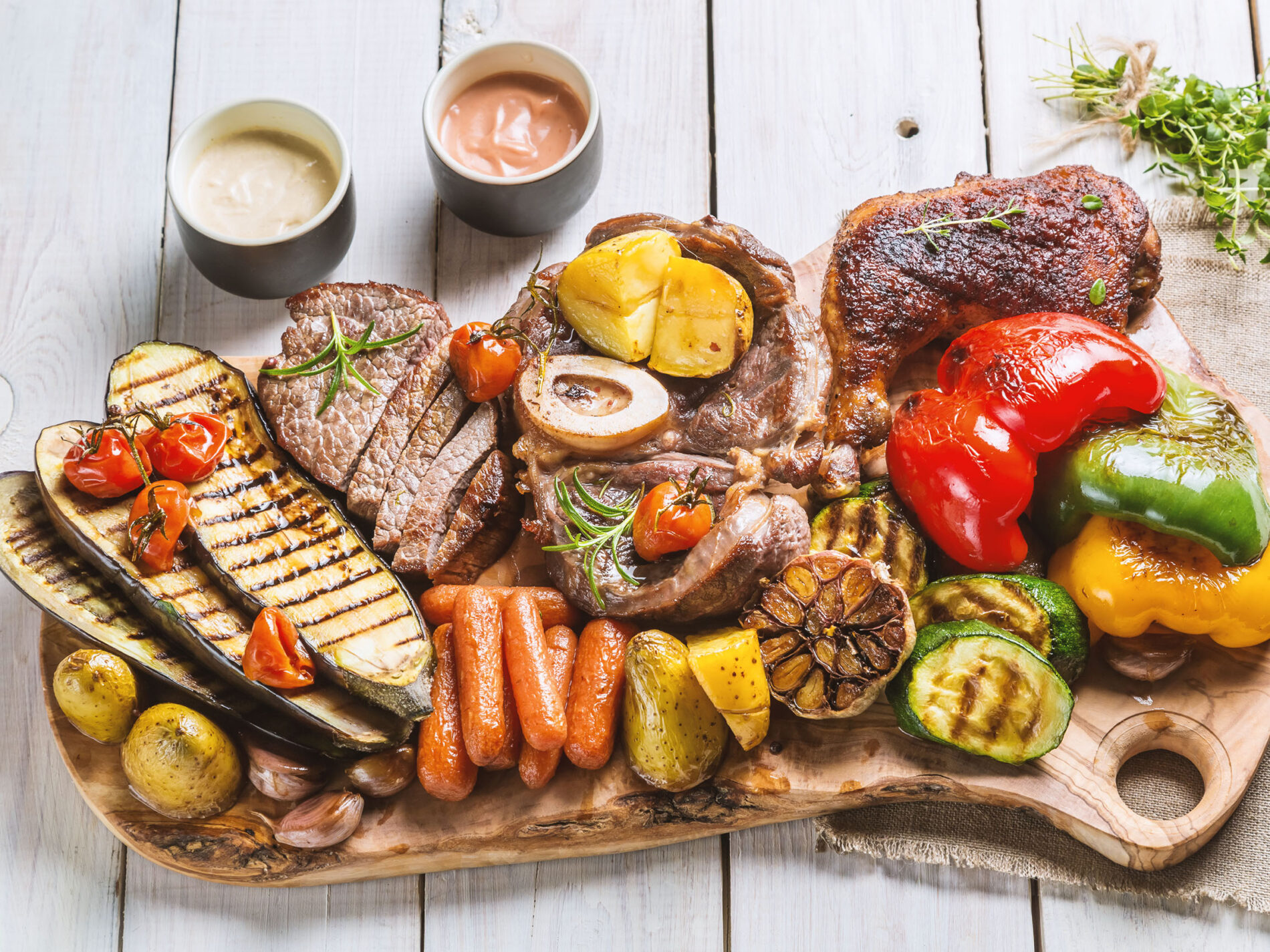 a plate of grilled vegetables and meat