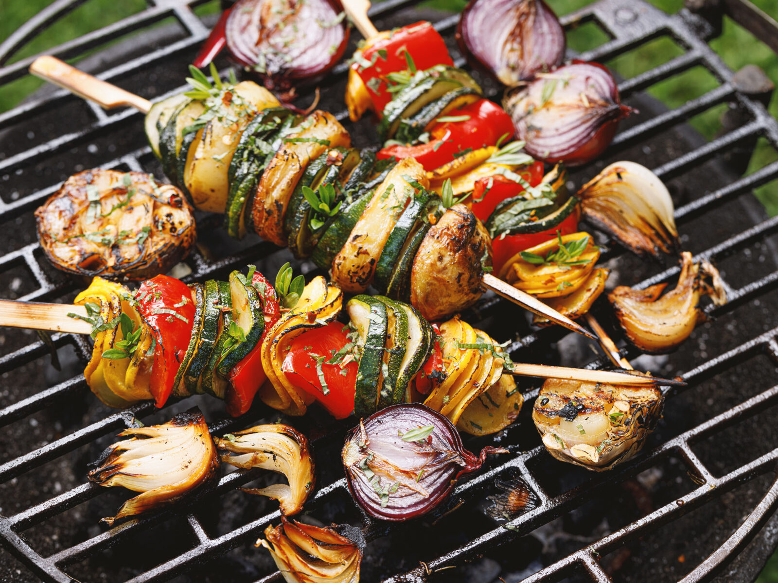 Roasted vegetable skewers on a grill roast