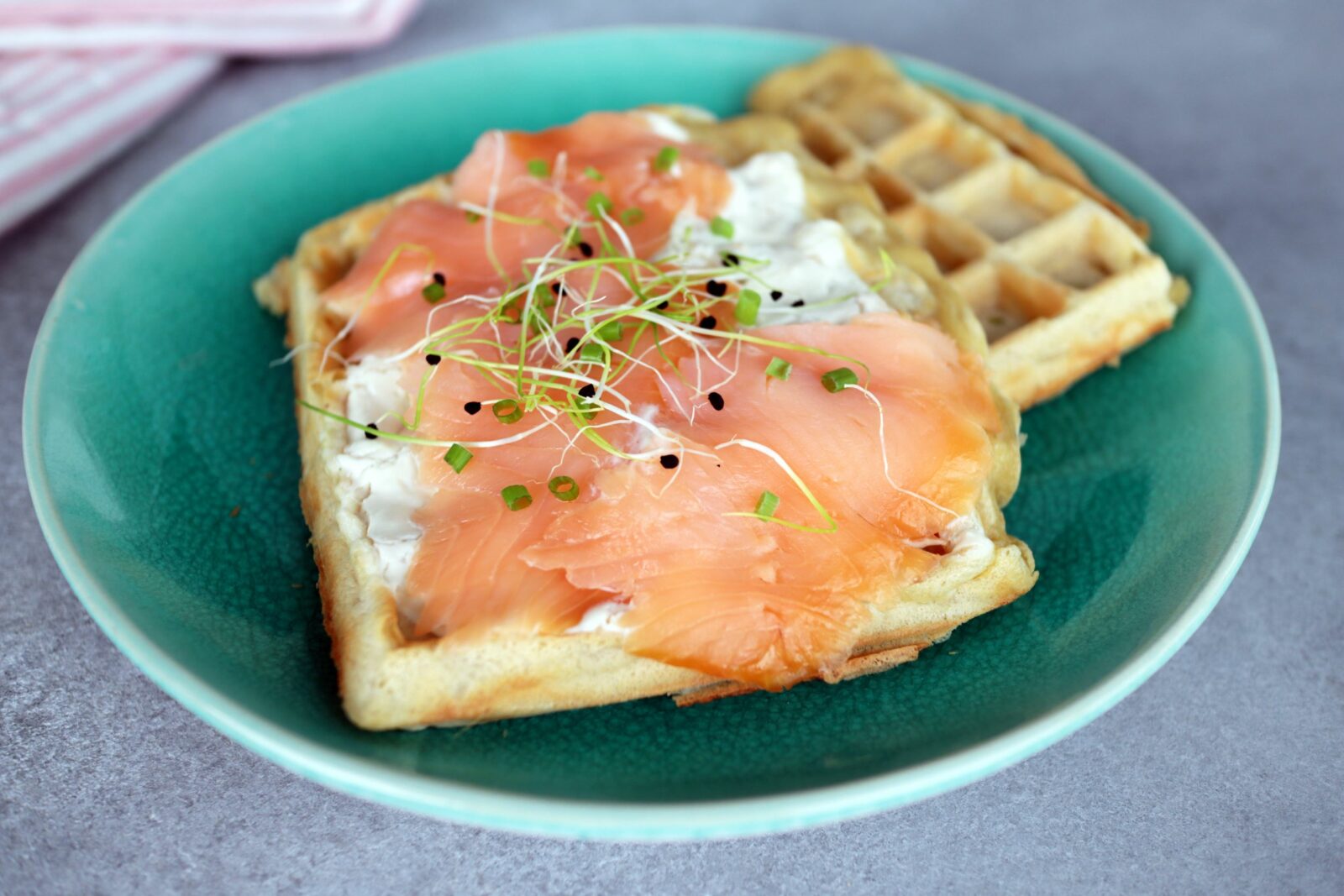 Courgette waffles with smoked salmon on top