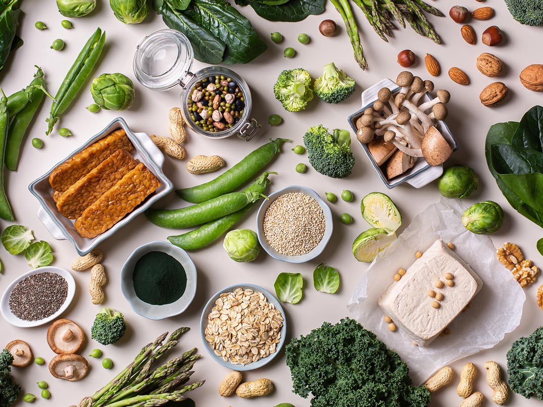 Green veggies, tofu, mushrooms and seeds assortment