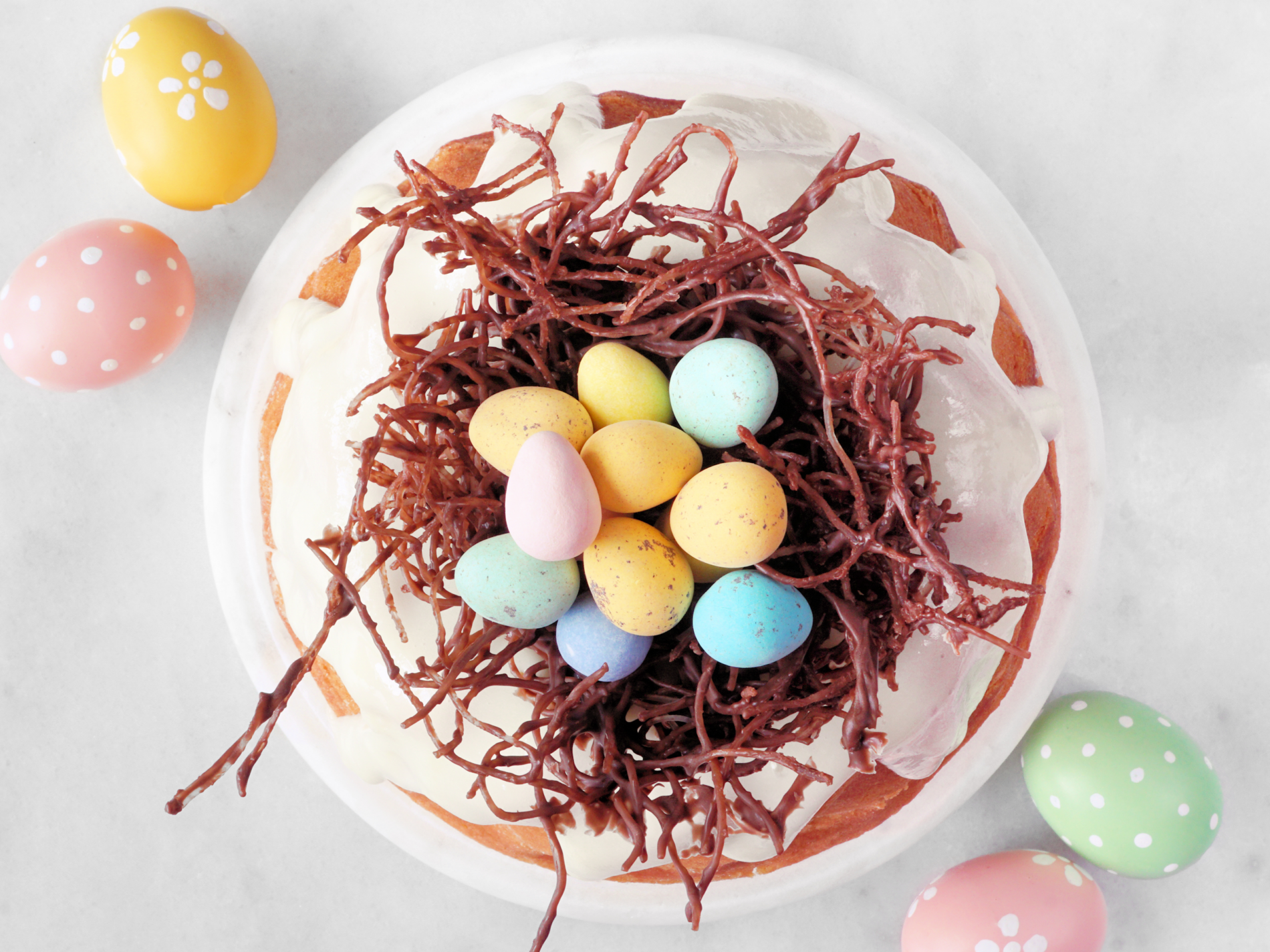 Edible chocolate Easter nest with colourful sugar eggs