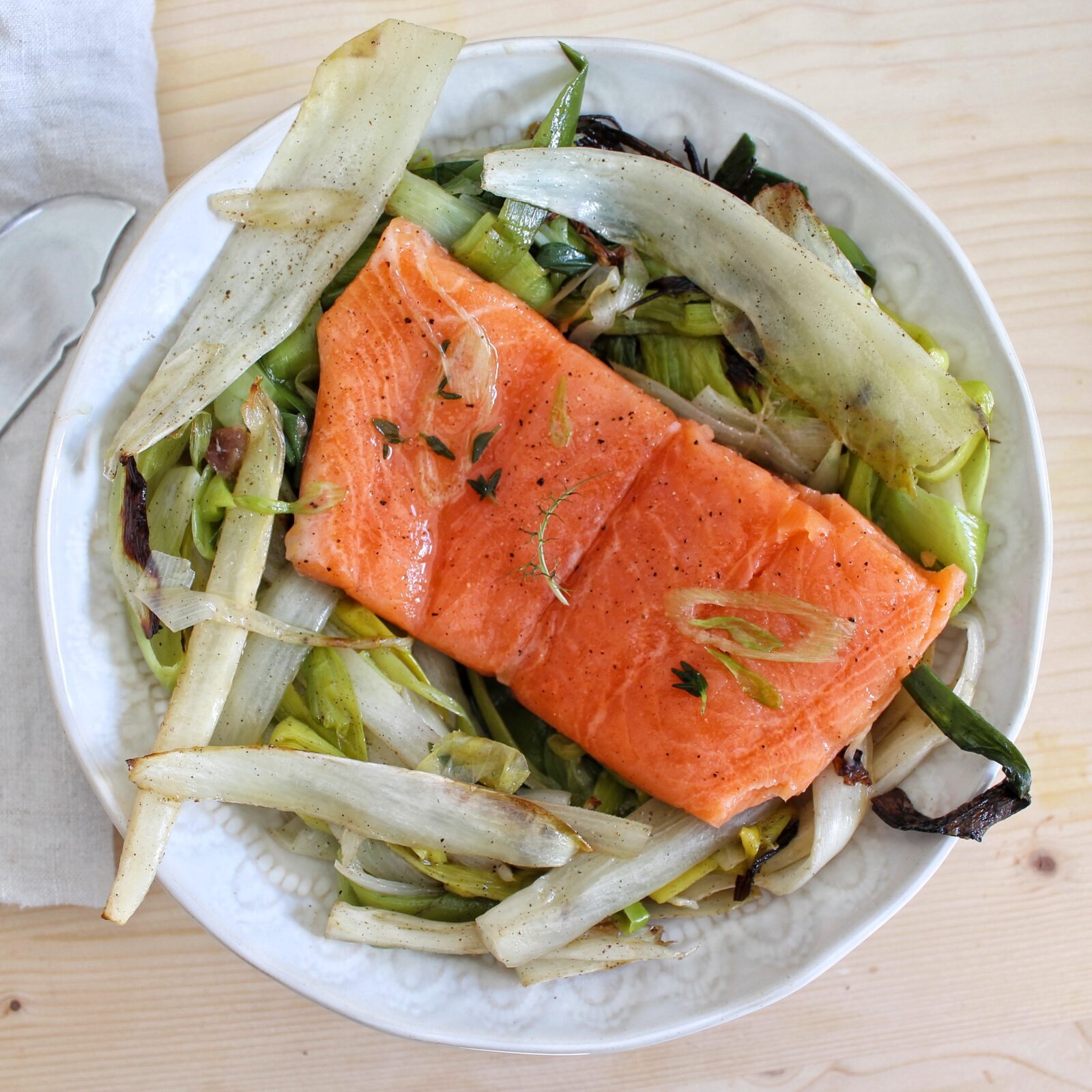 Rainbow trout on a bed of chicory and leek